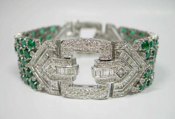 From Lorraine Wambold Estate Jewelry is an Emerald Buckle Bracelet.