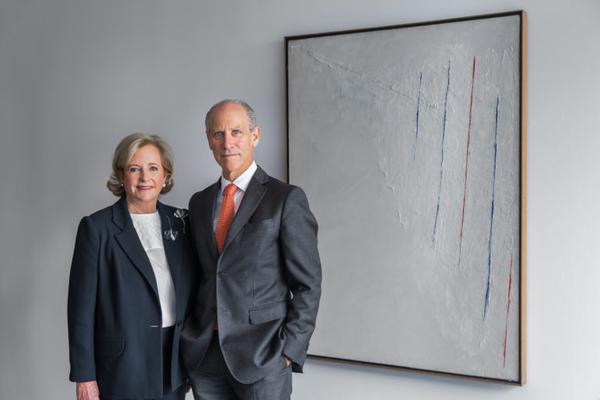 Patricia Phelps de Cisneros with Glenn D.  Lowry, Director of The Museum of Modern Art, next to a 1950 work by Alejandro Otero.