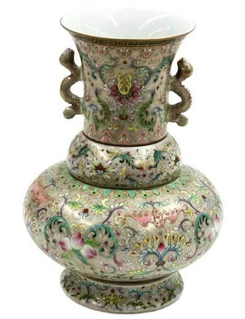 This Chinese multiple section vasiform porcelain container was estimated to bring $300 - $500, but sold for $27,255.