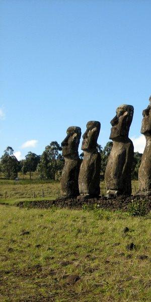 Ahu Akivi, one of the few inland ahu, with the only moai facing the ocean.