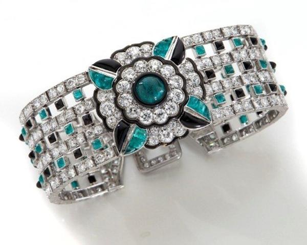 Art Deco Mauboussin platinum, diamond, emerald and black onyx bracelet, Estimate: $170,000-$200,000.00