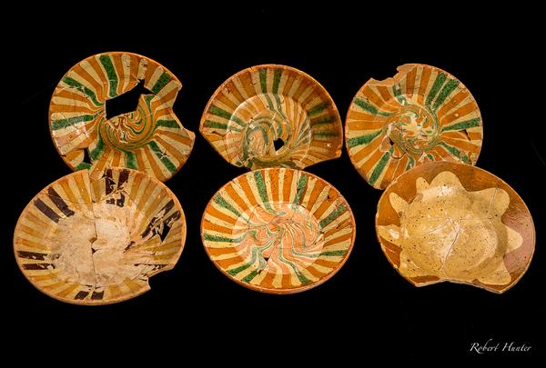 Decorative items from a remarkable assemblage of 18th-century slipware ceramics uncovered during an archaeological excavation in Philadelphia 