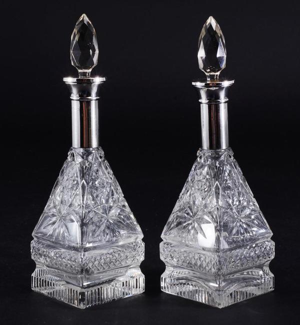 Pair of silver neck perfume bottles.  