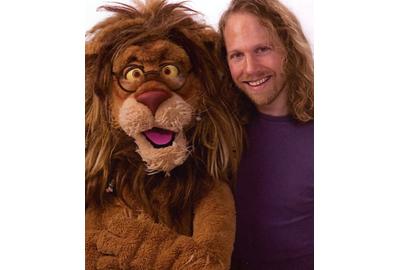 Peter Linz & his character, Theo of PBS's "Between the Lions"