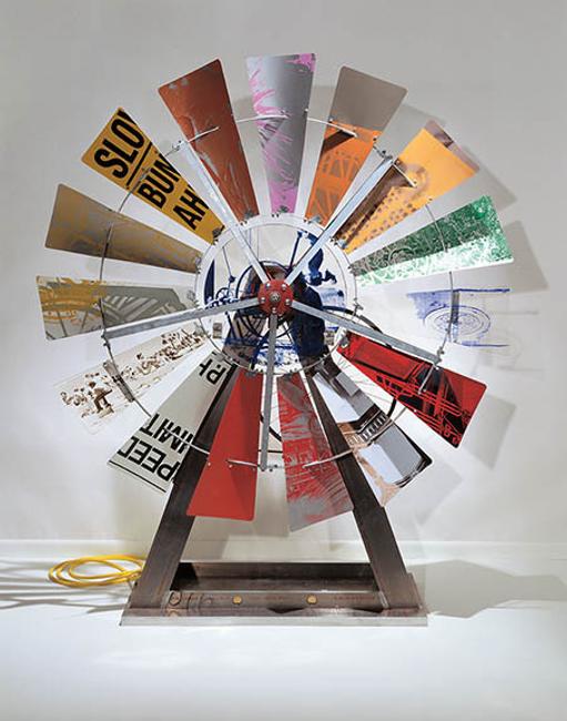 Robert Rauschenberg, Eco-Echo VIII, 1993, aluminum, sonar-activated motor, bicycle wheel, galvanized-steel windmill hardware, street signs, screenprinted acrylic, and hand-painting on aluminum and Lexan, 88 1/2 x 73 1/2 x 26 1/2 inches.  Collaboration: Donald Saff, Nick Conroy, Ken Elliott, Patrick Foy, George Holzer, and Conrad Schwable; assisted by Tim Amory, Maggi De Lamater, and Madeleine Shinn.