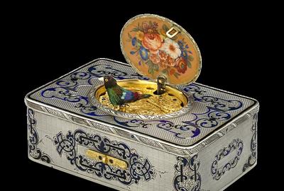 Frères Rochat crafted this rare, early Swiss singing bird box with the desirable fusée movement, housed in an elegant engraved silver and hand-enameled case.  Circa 1840.