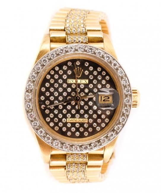 Ladies' Rolex Datejust President wristwatch in 18kt yellow gold, style #68278, having a black diamond dial set with 100 diamonds.  