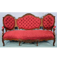 Rosewood triple-back sofa attributed to Alexander Roux, heavily carved and quite beautiful, 78 inches wide (estimate: $1,000-$2,000).