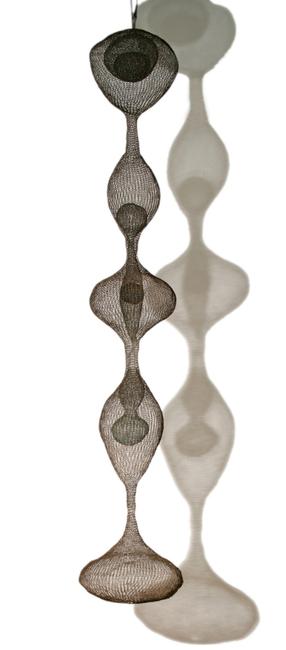 Heated bidding for Ruth Asawa's “Hanging Five-Lobed Continuous Form with Spheres Inside Four of the Lobes, c.  1954, which sold for $329,000