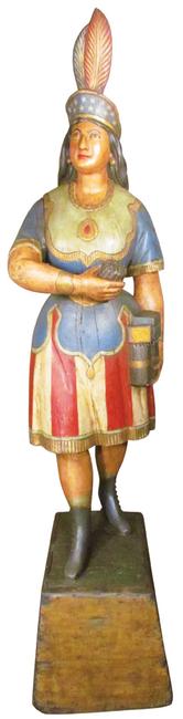 This antique Cigar Store Indian figure, by the renowned 19th century maker Samuel Robb, cast iron, later repainted, 82 inches tall, will be sold at auction Oct.  2-4.