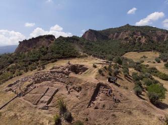 The site of the Lydian palace (Field 49), with the acropolis in the background, from the excavations at Sardis in Summer 2019.  © Archaeological Exploration of Sardis/President and Fellows of Harvard College.  