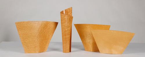 Group of four Colin Schleeh Designs birdseye and tiger maple molded pocket vases, dated 2002-2003 ($600-800).