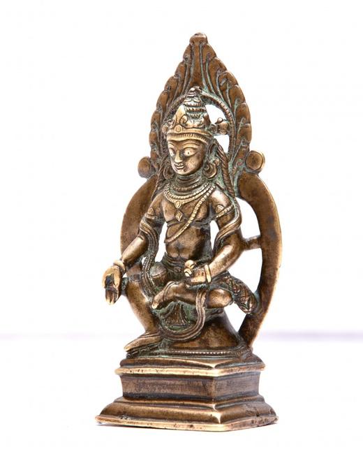 Kashmiri gilt bronze figure of seated Buddha with inlaid silver eyes, possibly 12th century AD, 4 ¼ inches tall (est.  $10,000-$12,000).