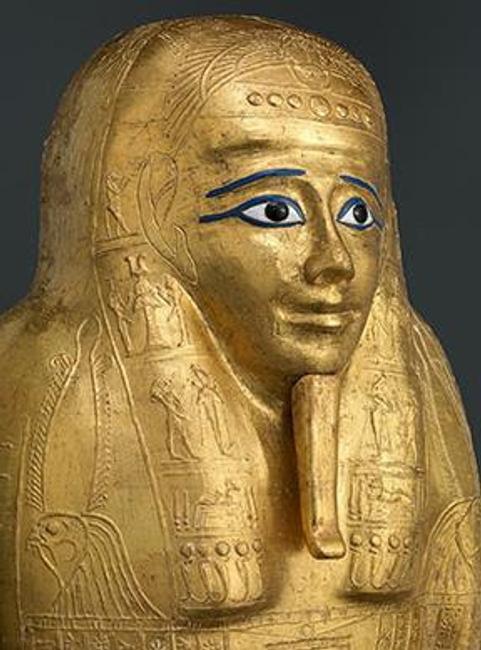 Gilded Coffin Lid for the Priest Nedjemankh (detail).Late Ptolemaic Period (150-50 B.C.).  Cartonnage, gold, silver, resin, glass, wood.  Purchase, 2017 Benefit Fund; Lila Acheson Wallace Gift; Louis V.  Bell, Harris Brisbane Dick, Fletcher, and Rogers Funds and Joseph Pulitzer Bequest; Leona Sobel Education and The Camille M.  Lownds Funds; and 2016 Benefit Fund, 2017 (2017.255b).  Image © The Metropolitan Museum of Art, New York