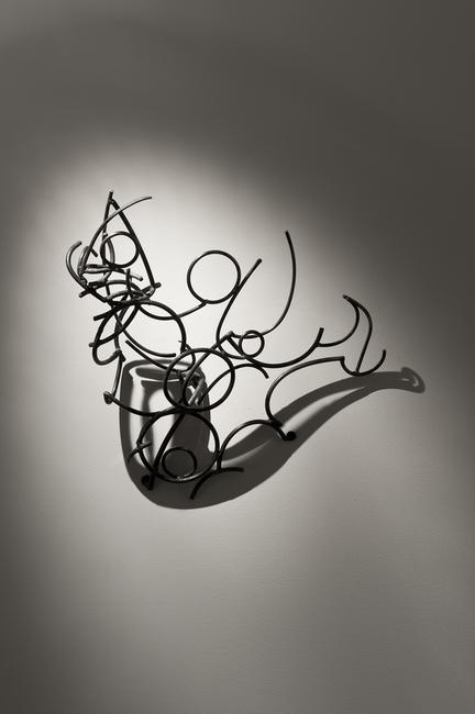 KAGAN, LARRY, B.  1946.  Magritte's Paradox, 2012, steel and shadow.  19 " x 22 " x 9 3/4" 