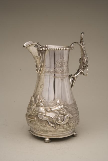 A coin silver, footed pitcher with Russian winter scene to be auctioned by Witherell's Nov.  4