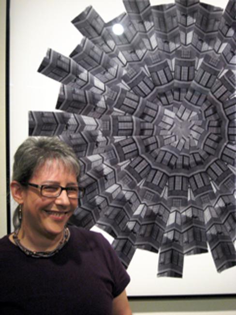 Adrienne Moumin in front of "Kaleidoscope (Starrett-Lehigh)." Photo by Joseph Silva.