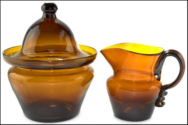 Freeblown sugar bowl with matching creamer in amber, Zanesville Glass Works, circa 1820-1835 (est.  $35,000-$45,000).