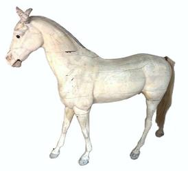 Realistically modeled, life-size wood tack shop horse figure made in the early 20th century of wood and gesso, 82 inches tall, painted white, with natural horsehair tail (est.  $2,000-$4,000).