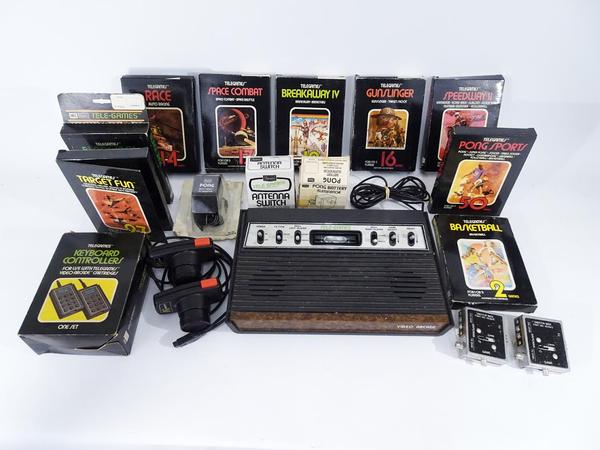 Atari Tele-games 2600 console and 10 video games, est.  $200-$400