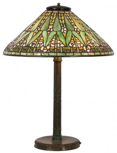 This Tiffany Studios Arrowroot table lamp with 20-inch diameter conical form shade, 26 inches tall, will come up for bid June 21st.