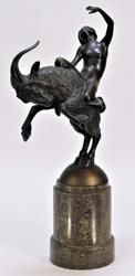 Bronze statue of a classical nude woman with a raised arm on the back of a rearing ram by Walter Sebastian Resch (German, 1889-1962), overall 18 ½ inches tall (est.  $1,500-$2,500).  