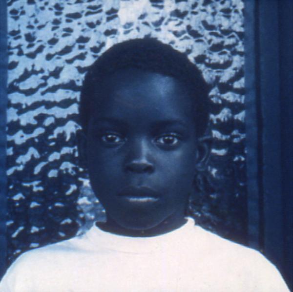 Carrie Mae Weems, Blue Black Boy, 1997 Blue-toned print, 5 3/8 x 15 1/4 inches (39 x 38.7 cm); Framed: 31 1/8 x 31 1/8 x 1 7/16 inches (79.1 x 79.1 x 3.8 cm) Collection Jack Shainman, New York © Carrie Mae Weems.  Courtesy of the artist and Jack Shainman Gallery, New York.  