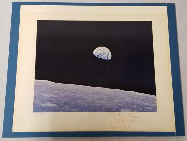 NASA photo signed and inscribed by German-born American engineer Dr.  Wernher Von Braun, showing a view from Earth from the Apollo 8 spacecraft in orbit around the moon ($14,400).