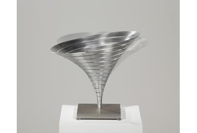 Martin Willing (b.  1958) Parabolkegel groß, 1991 Duraluminum, water jet cut, curved, prestressed, embedded in titanium plate 11 3/8 (H) inches, 14 1/8 inches diameter (29 (H) cm, 36 cm diameter) 