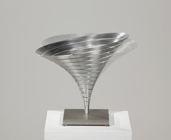 Martin Willing (b.  1958) Parabolkegel groß, 1991 Duraluminum, water jet cut, curved, prestressed, embedded in titanium plate 11 3/8 (H) inches, 14 1/8 inches diameter (29 (H) cm, 36 cm diameter) 