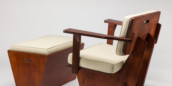 Armchair and Ottoman designed by Frank Lloyd Wright (1867 – 1959) for the Robert D.  Winn Residence in Kalamazoo, MI, 195 0 , wood with cloth upholstery.  Collection Kirkland Museum of Fine & Decorative Art, Denver