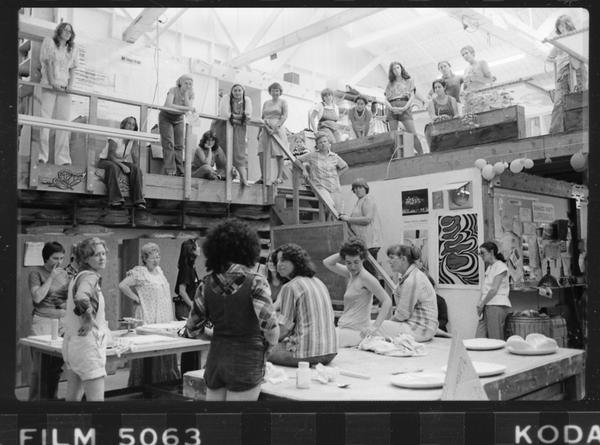 Judy Chicago addresses a gathering of volunteers in the Dinner Party studio, ca.  1978, studio.