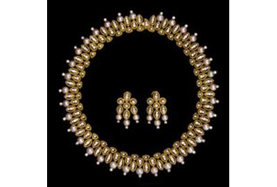 A Hammerman Brothers 18 karat yellow gold necklace and earrings, contains 285 round brilliant cut diamonds and 40 cultured pearls (estimate $15,000 to $20,000).