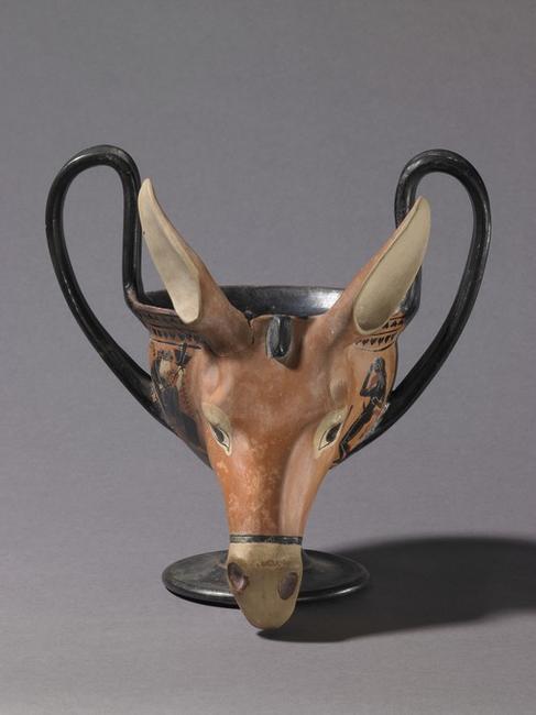 Donkey head kantharos depicting Dionysos and his entourage.  520-500 BCE, Greece.