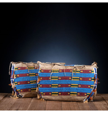 Cheyenne Beaded Hide Possible Bags, Matched Pair.  Fourth Quarter Nineteenth Century.  Price Realized: $31,250