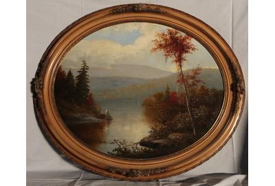 Norton Bush (American, 1834 - 1894): Autumn Scene in the Adirondacks - Oil on board, oval, 26 inches wide/Signed lower right