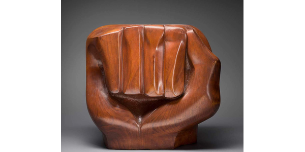 From the traveling exhibition "Soul of a Nation: Art in the Age of Black Power 1963–1983," Elizabeth Catlett, “Black Unity,” 1968.  Cedar, 21 in.  × 12 1/2 in.  × 23 in.  (53.3 × 31.8 × 58.4 cm).  Crystal Bridges Museum of American Art, Bentonville, Arkansas, 2014.11.  Photograph by Edward C.  Robison III © 2019 Catlett Mora Family Trust / Licensed by VAGA at Artists Rights Society (ARS), NY