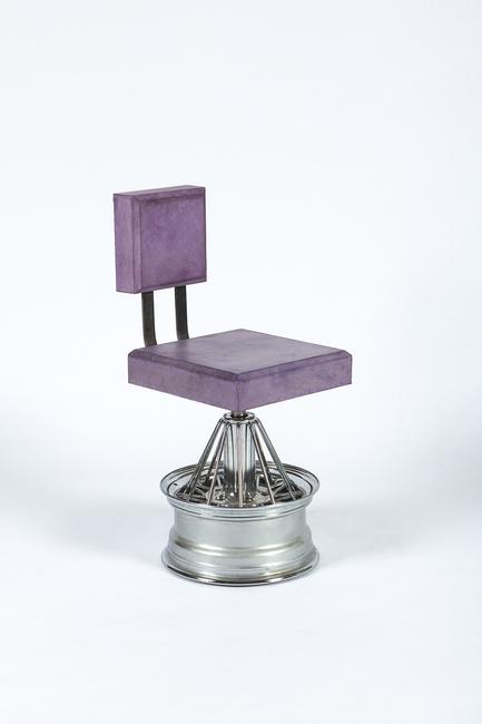 Dozie Kanu, Chair [ iii ], 2018.  Poured concrete, steel, rims, 37 × 19 × 16 1/2 in.  Courtesy the artist and Salon 94.