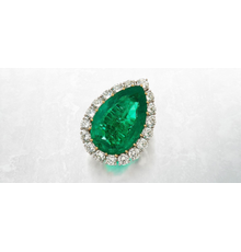 Lot 50: The Wakil Emerald Platinum, gold, emerald and diamond ring, Van Cleef & Arpels, circa 1974.  