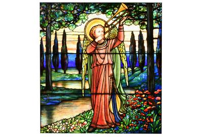 An auction highlight is this Tiffany Studios “Gabriel Blowing His Horn” leaded glass window ($70/90,000), circa 1916, measuring 51½ by 49 inches (framed).  