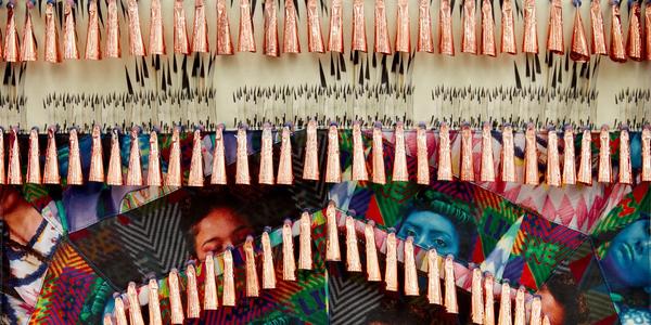 DETAIL: Jeffrey Gibson (Choctaw and Cherokee, b.  1972) The Anthropophagic Effect, Garment no.  2, 2019.  Canvas, cotton, vinyl, brass grommets, nylon thread, artificial sinew, dried pear gourds, copper jingles, glass and plastic beads, nylon ribbon.  Overall: 58 x 72 inches © Jeffrey Gibson Photography by Jason Wyche 