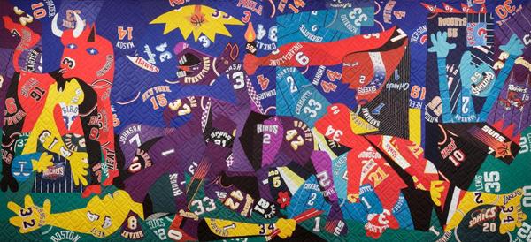 Hank Willis Thomas (American, born 1976).  Guernica, 2016.  Mixed media including sport jerseys.  131 x 281 inches.  © Hank Willis Thomas.  Courtesy of the artist and Jack Shainman Gallery, New York.