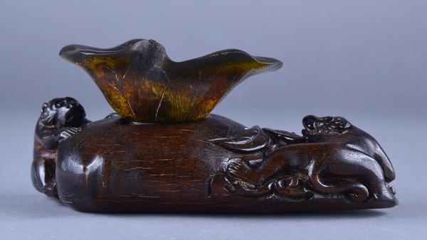 Lot 268: 17th/18th C.  Chinese Rhinoceros Horn Lotus Cup ($5,000-10,000)