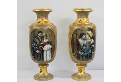 A large pair of French enameled faience, gold and platinum ground and Coraline decorated porcelain urns, 35 ½ inches tall ($8/12,000).