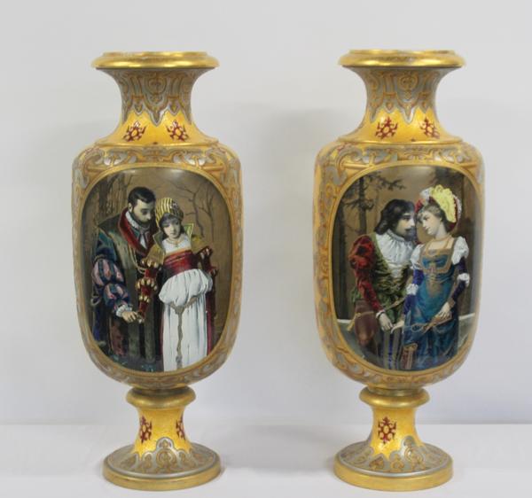 A large pair of French enameled faience, gold and platinum ground and Coraline decorated porcelain urns, 35 ½ inches tall ($8/12,000).