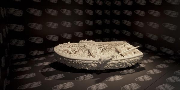 Yayoi Kusama, Aggregation: One Thousand Boats Show, 1963.  60.0 x 130.0 x 265.0 cm 2) oar: (l)169 x (h)12 x (b)13.  Rowboat with oars, covered by plaster castings in white cotton, a pair of lady's shoes.  © YAYOI KUSAMA, Courtesy: Collection Stedelijk Museum Amsterdam