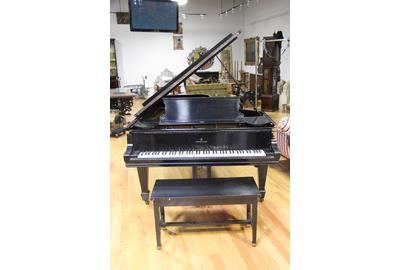 This Steinway & Sons Model D Concert Grand piano ($15/25,000) will cross the block.  