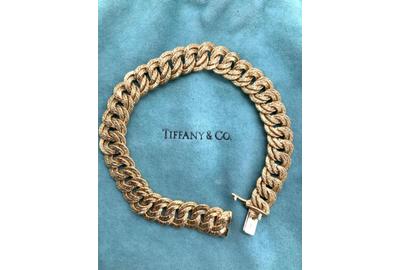 Among designer jewelry is this Tiffany & Co.  18K gold chain curb link bracelet, France ($500-2,000) that measures 7¾ inches long.