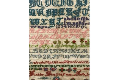 Among alphabet samplers is a Pennsylvania Amish sampler wrought by Katie Stoltzfus dated February 1, 1911, 25 ¾ by 18¼ inches.