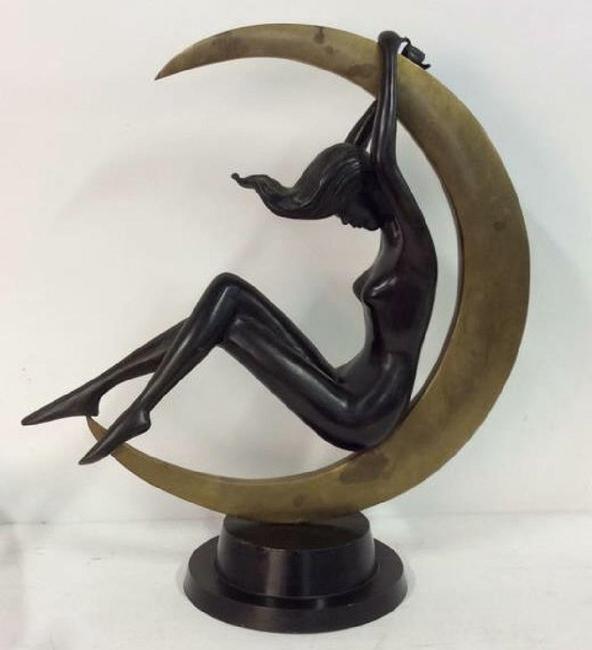 The top lot of the action was a bronze Art Deco statuette of a nude woman reclining inside a crescent moon, 23 by 20 by 9 inches, that went to a phone bidder for $1,905.